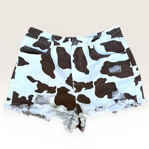 Brown & White Cow Print Distressed Denim Shorts